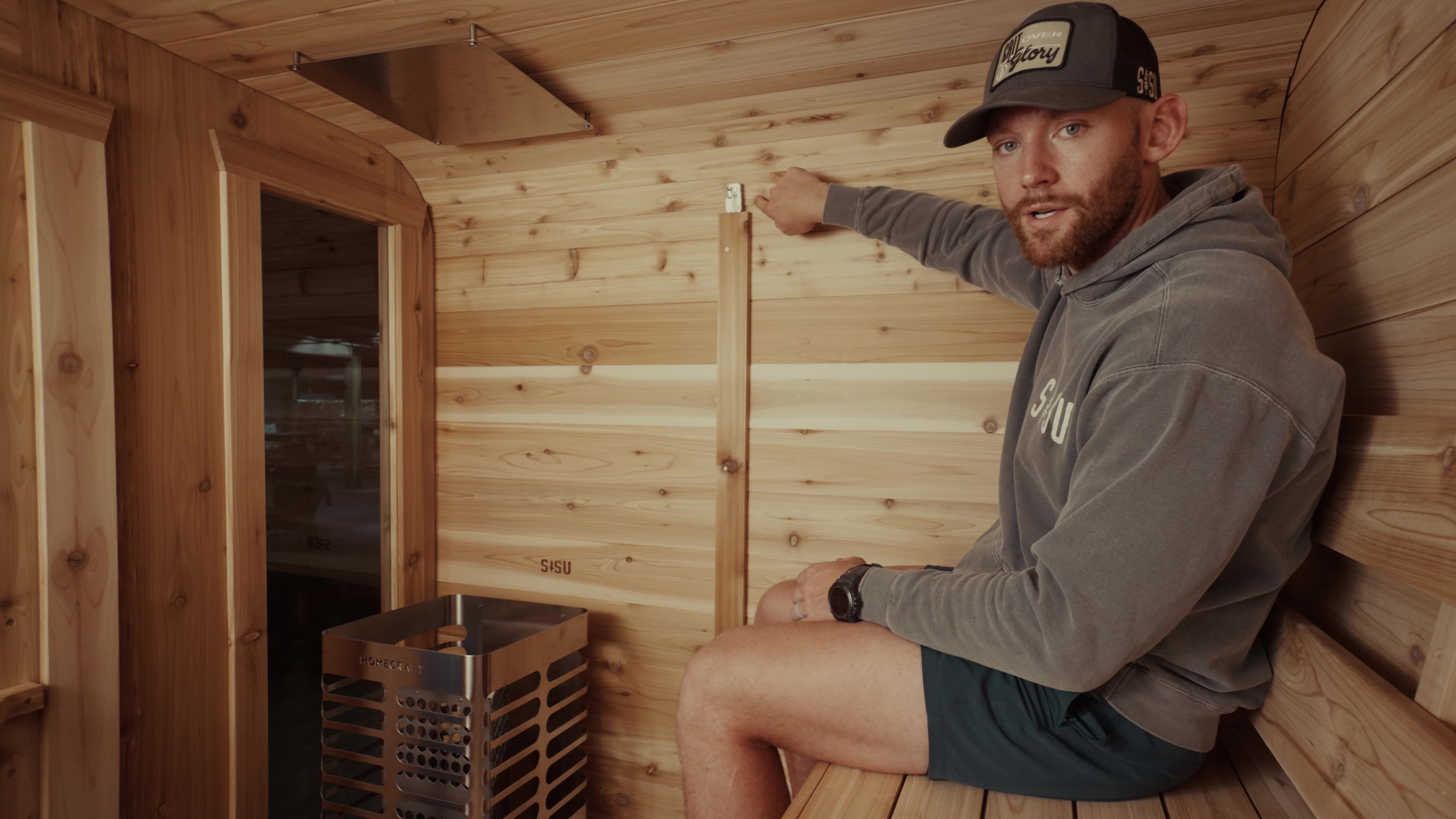 Pete Nelson II inside a SISU cabin sauna
