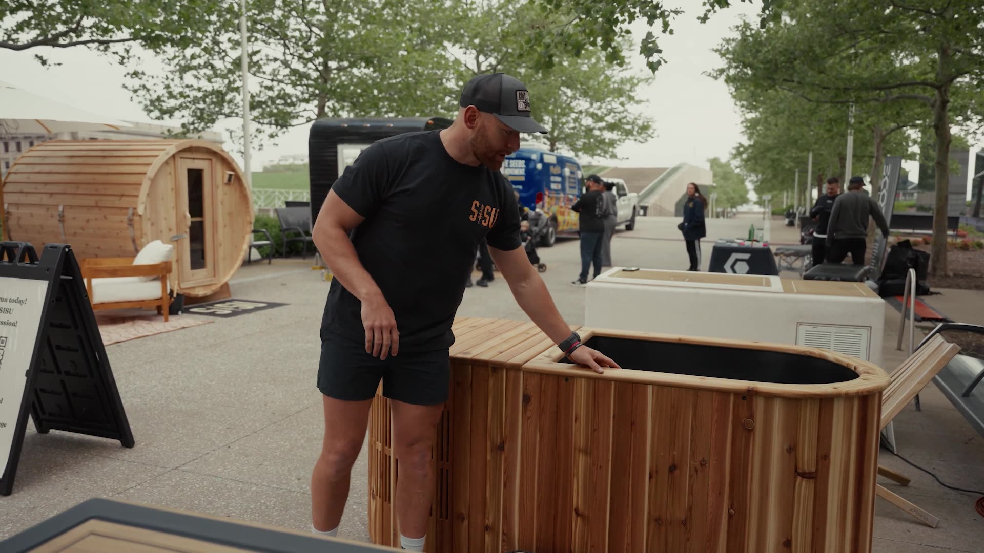 Pete Nelson II showing a SISU cold plunge at an outdoor event