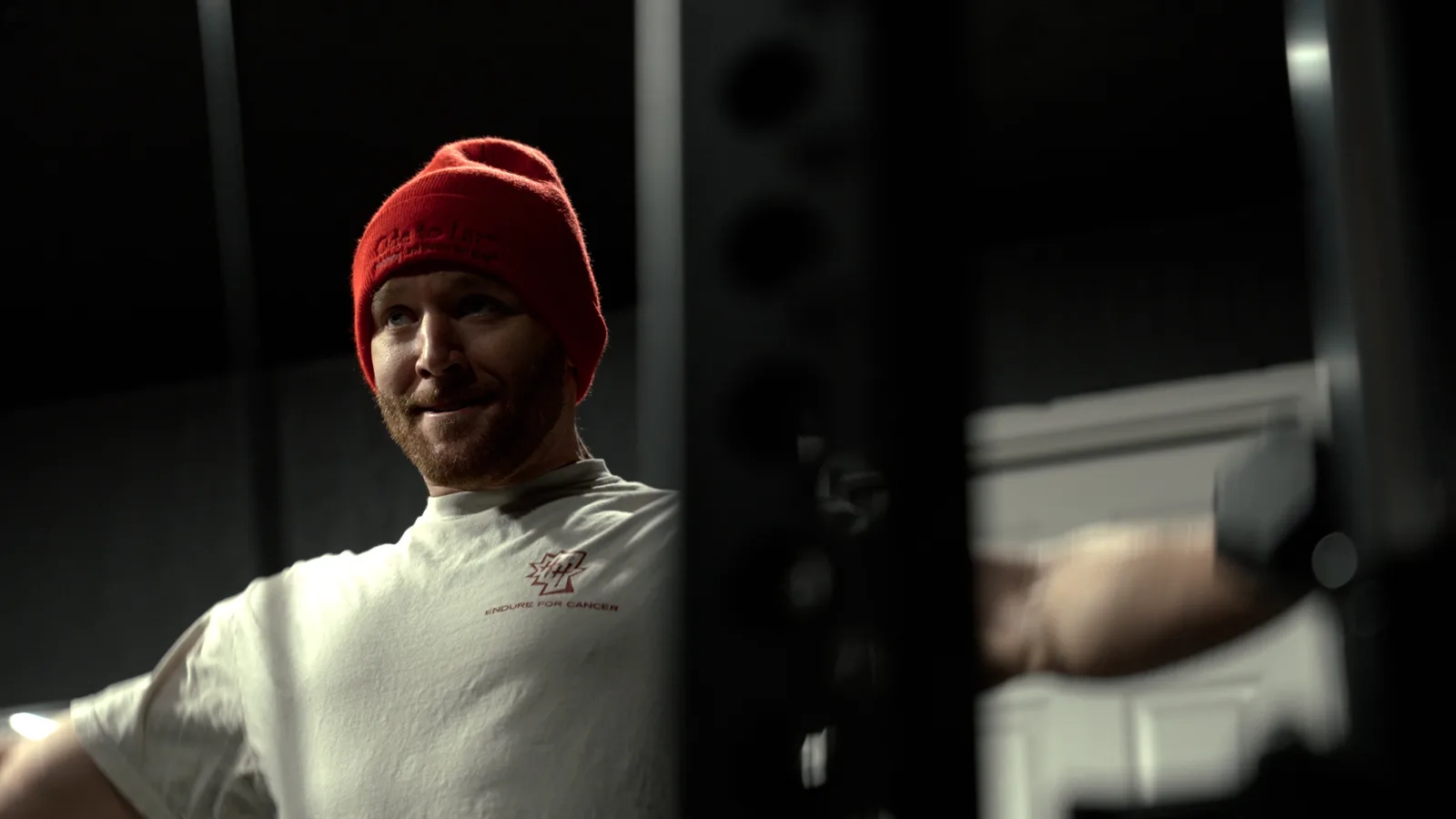Pete Nelson II in a red SISU beanie