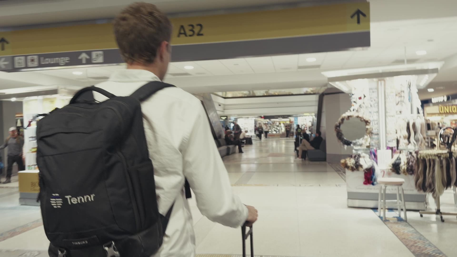 Trey beginning the Tennr product tour at the airport